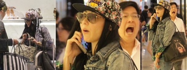 张柏芝为躲避狗仔队现场演戏 手机拿反漏破绽 张柏芝为躲避狗仔队现场演戏 手机拿反漏破绽